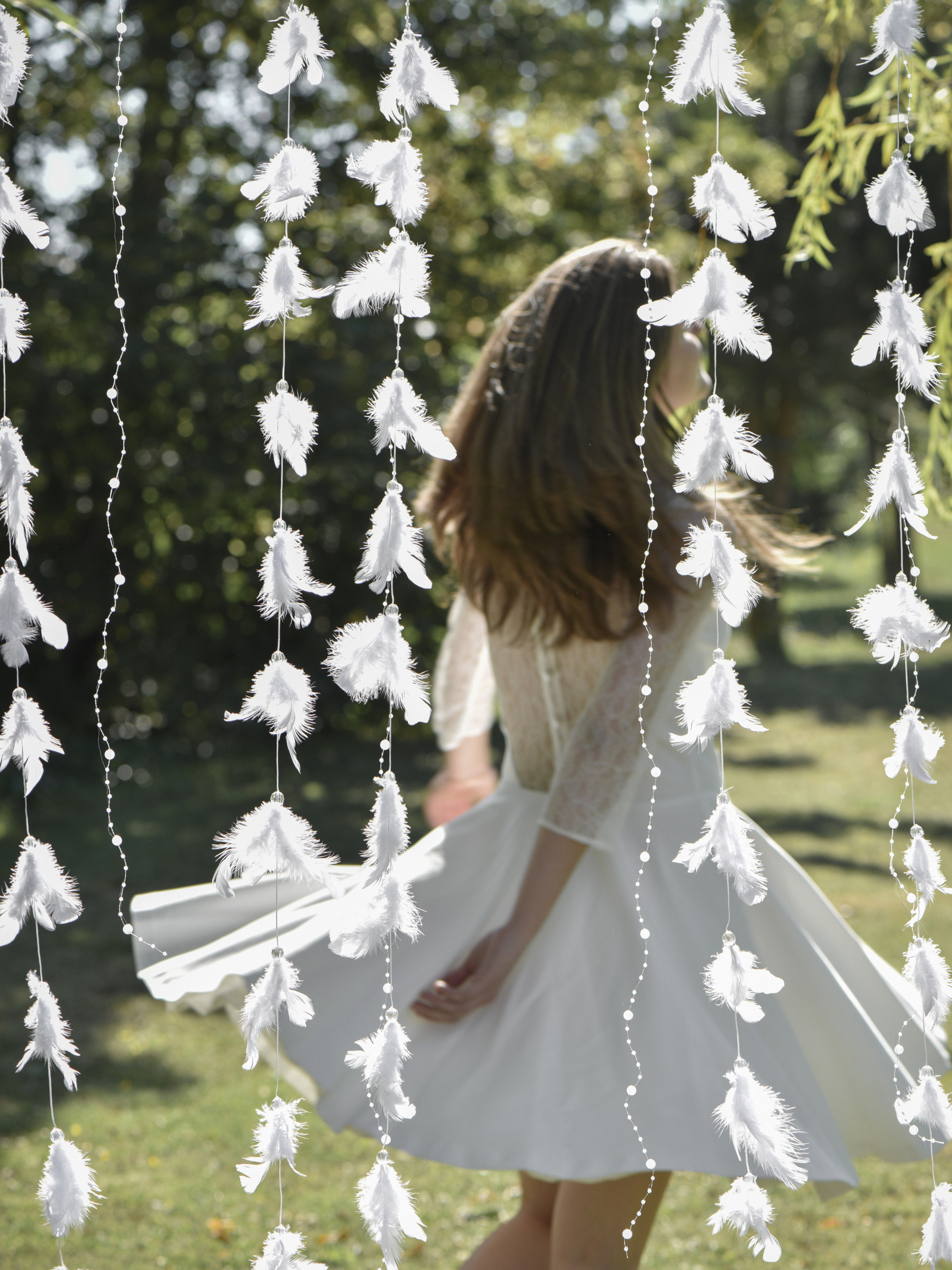 Guirlande de plumes blanche 1 m