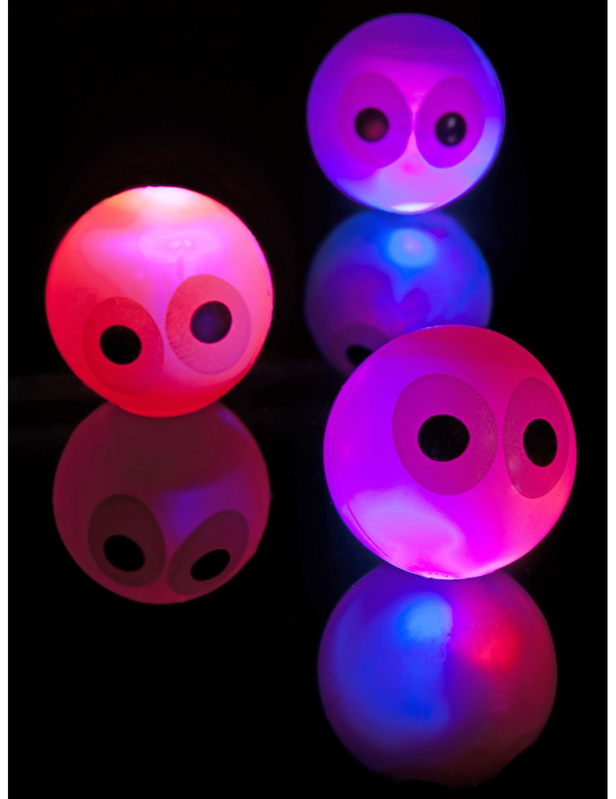 Balle rebondissante lumineuse avec yeux 14cm