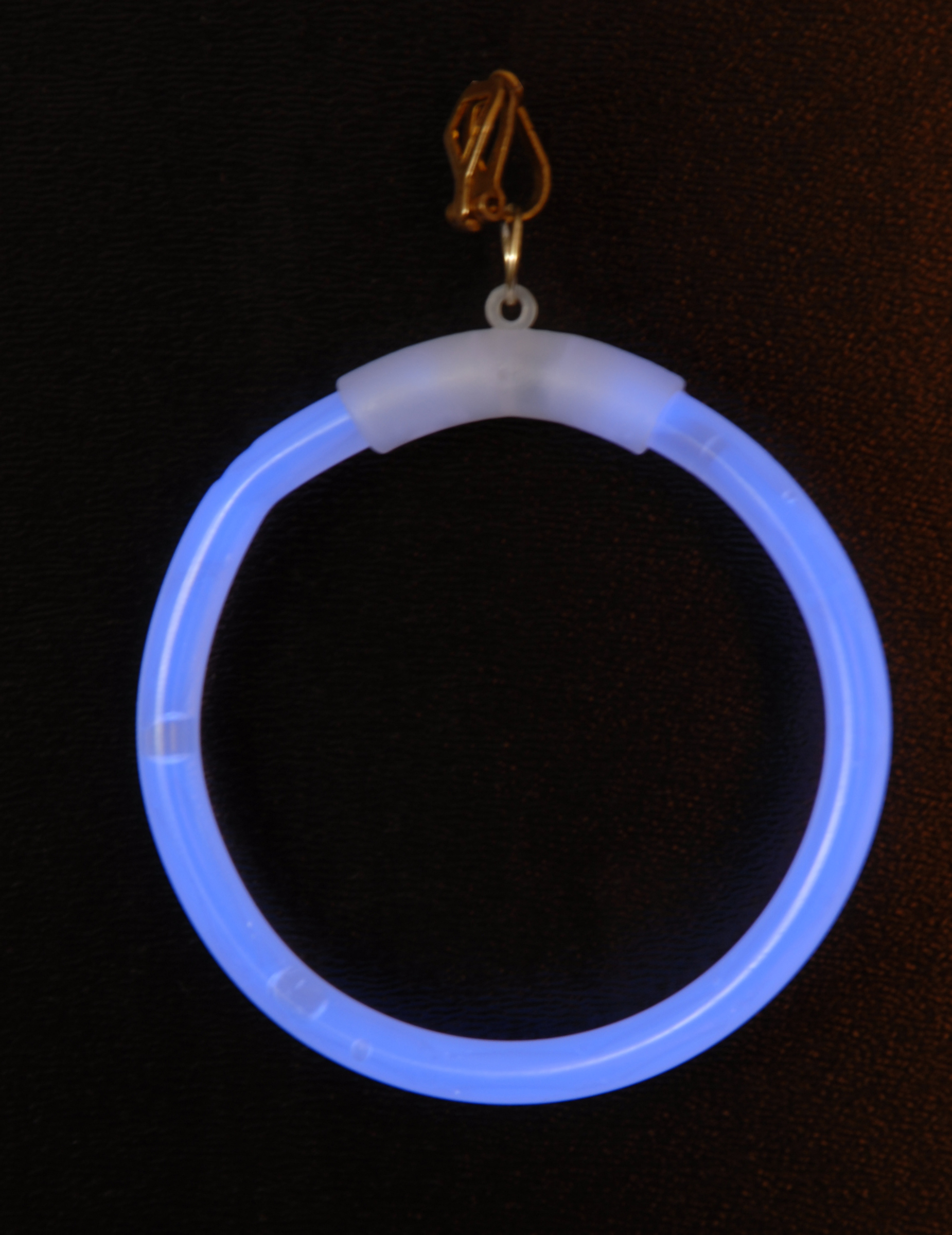 Boucles d'oreilles phosphorescentes bleues adulte